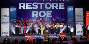 Photo of Harris and Walz on stage. Photo by Anna Moneymaker / Getty Images